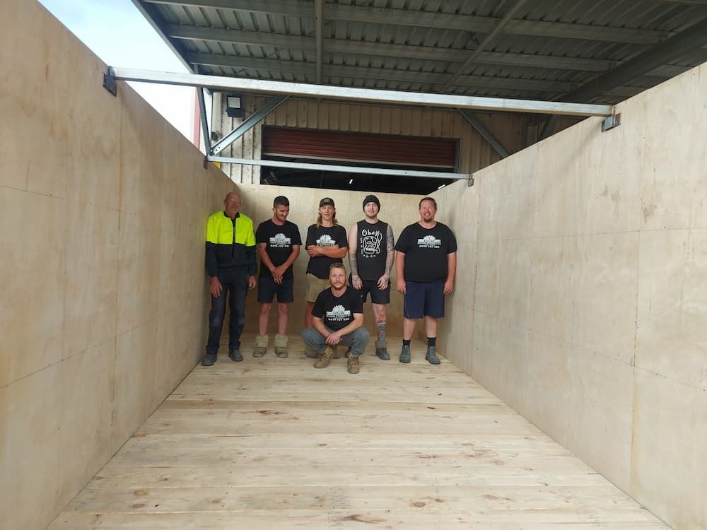 People Inside the Wooden Crate — DGW Wood Products in Kurri Kurri, NSW