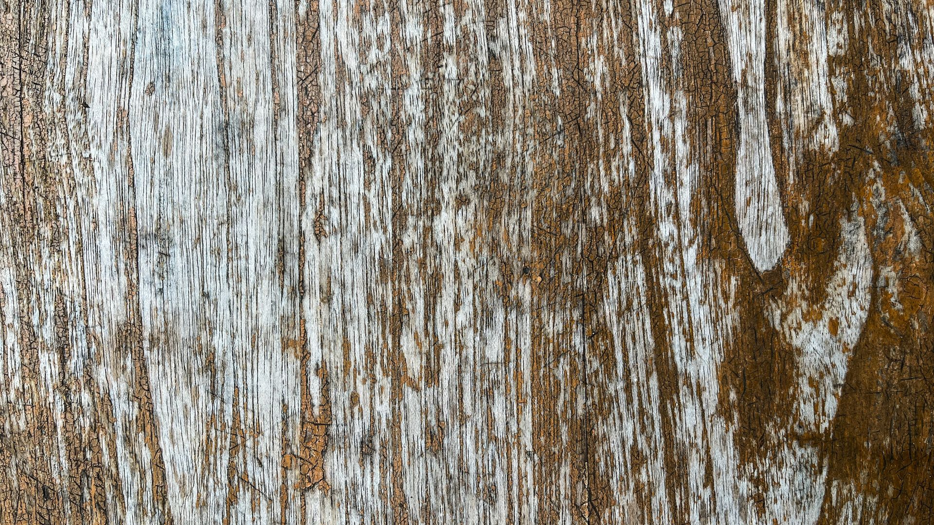 Weathered wood grain, vertical streaks of brown and silver.