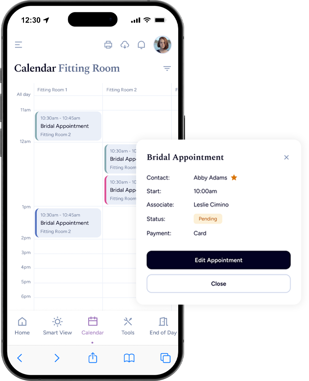 Mobile phone displaying a calendar with a pop-up showing details for a