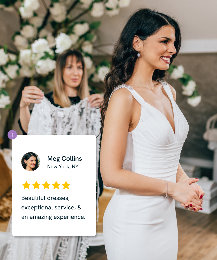Bride in a white gown being helped by a stylist; review reads 
