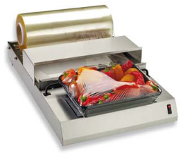 Una máquina que envuelve alimentos en film plástico