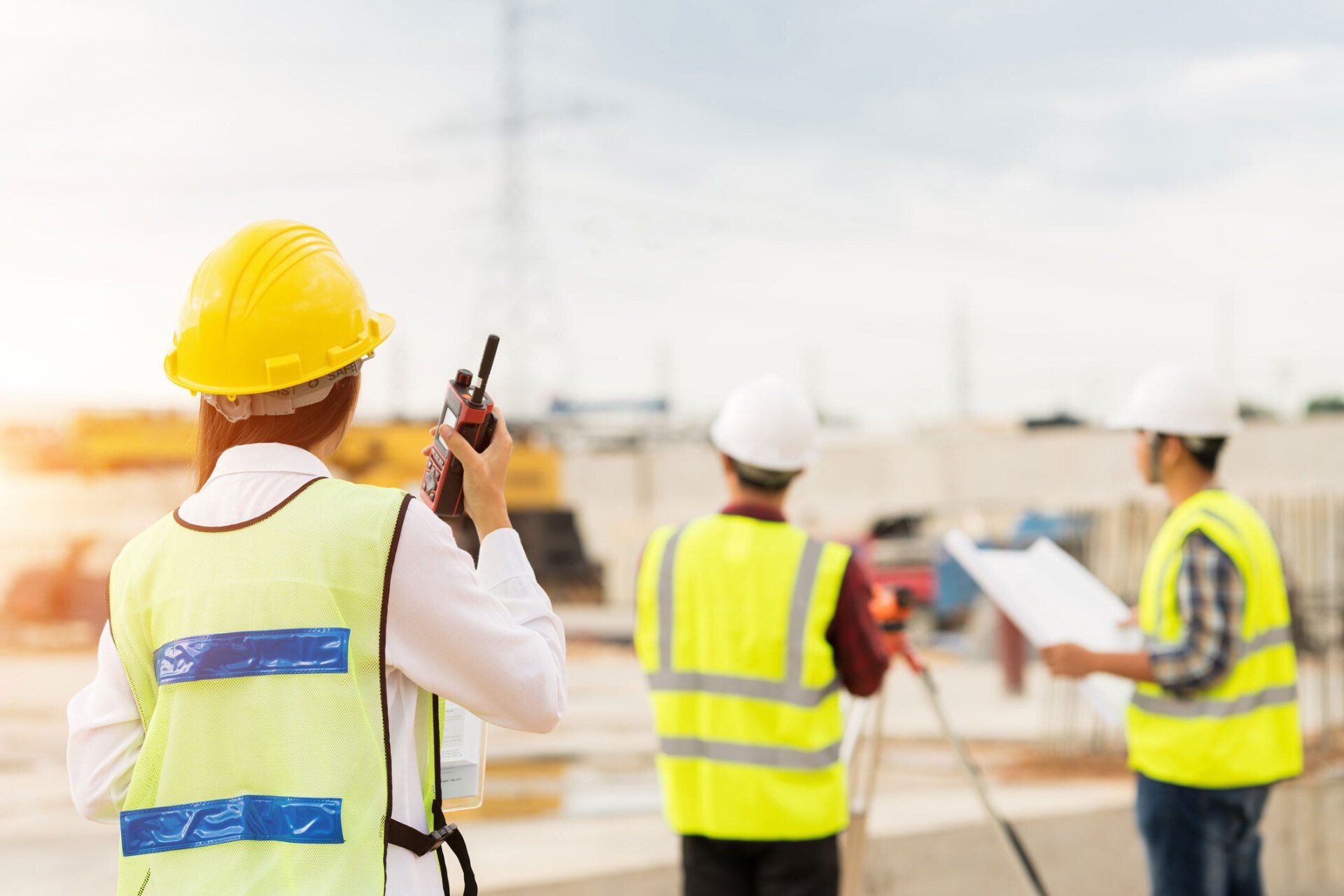Engineers Using Walkie Talkie to Communicate — Curtin, ACT — Shaw Surveys Pty Ltd