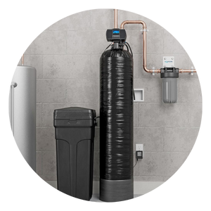Water softener system in a utility room with a tank, salt storage, and filter.