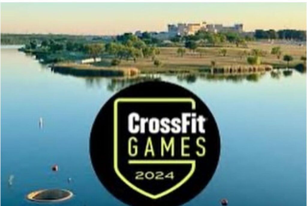 A logo for crossfit games 2024 with a lake in the background