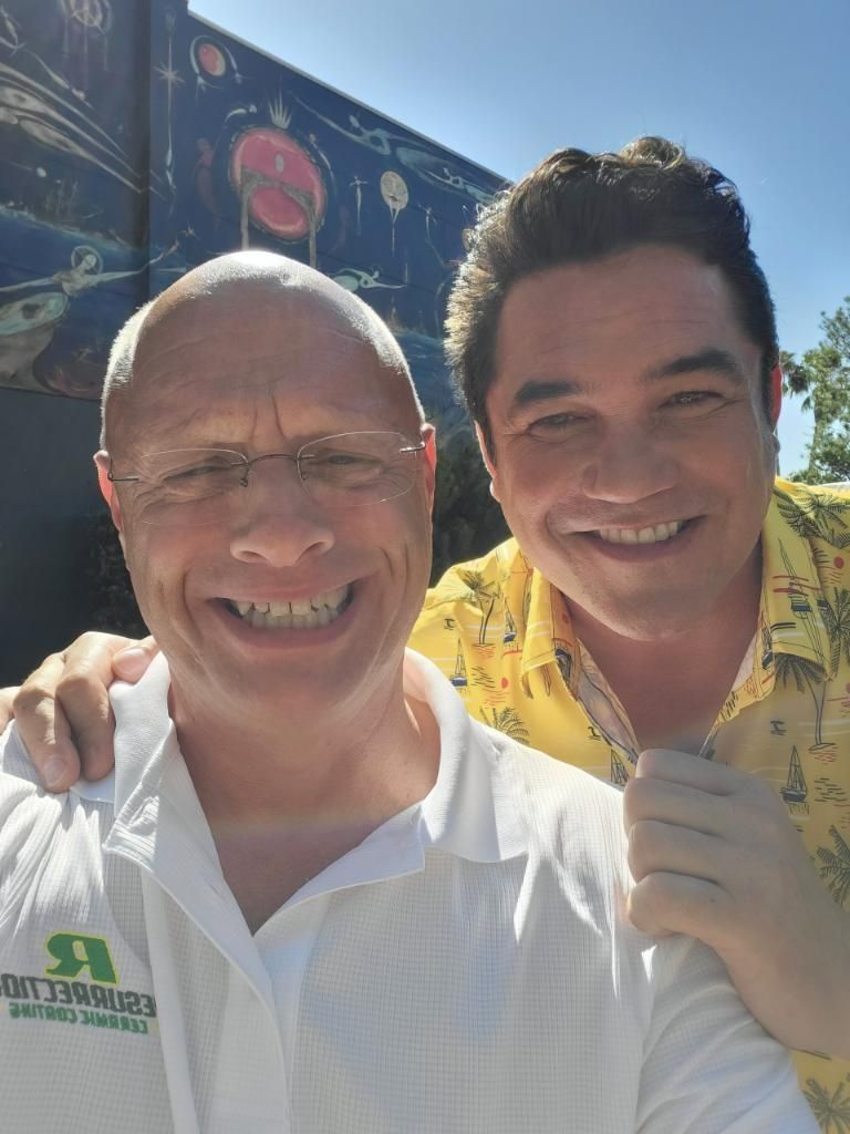 Dean Cain and Steve Calafato posing for the camera on the set of RADAR, Adventures of the Bionic Dog