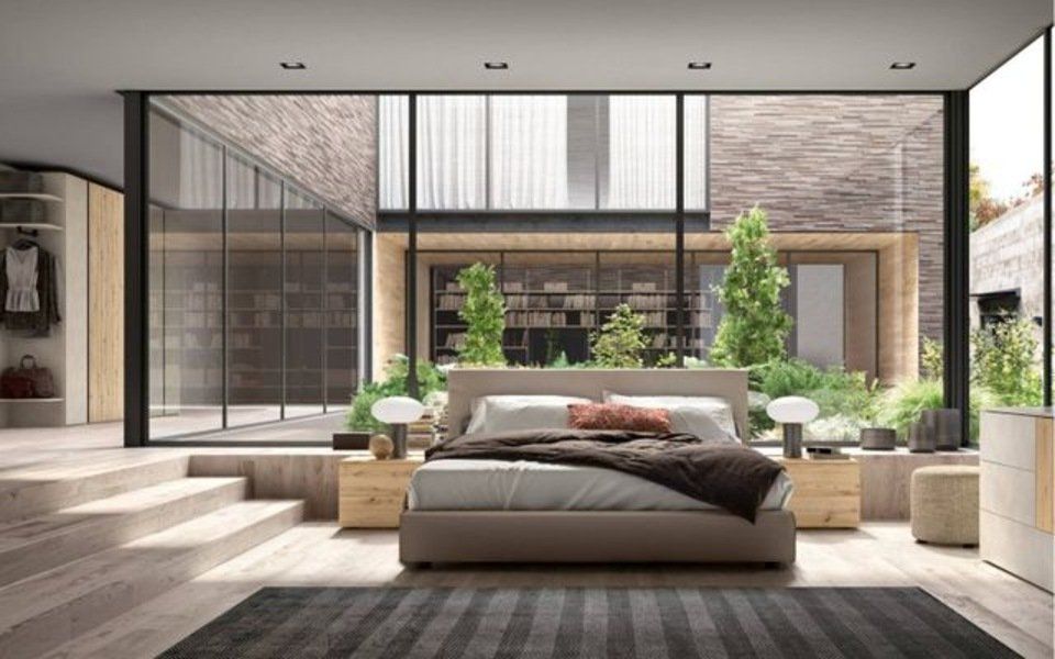 camera da letto con arredi moderni e piante