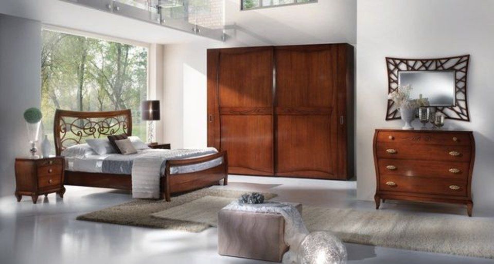 camera da letto con armadio, comò e letto in legno massello