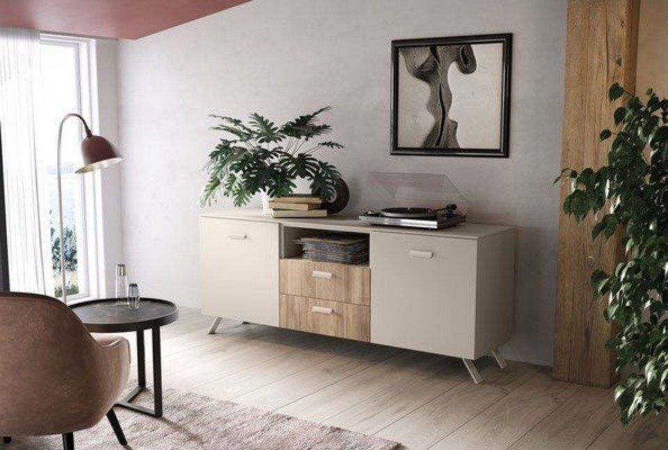 madia beige con cassetti in legno e pianta