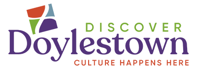 A logo for discover doylestown culture happens here