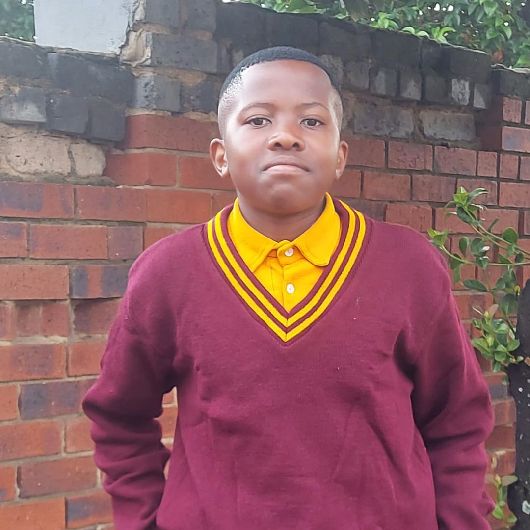 Thirteen years later - Pono-Entle Maluleke in his school uniform.