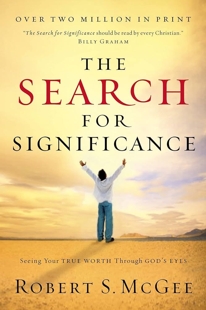 Book cover: Man with arms raised towards sky, 