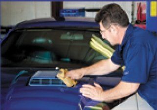 mechanic repairing the car