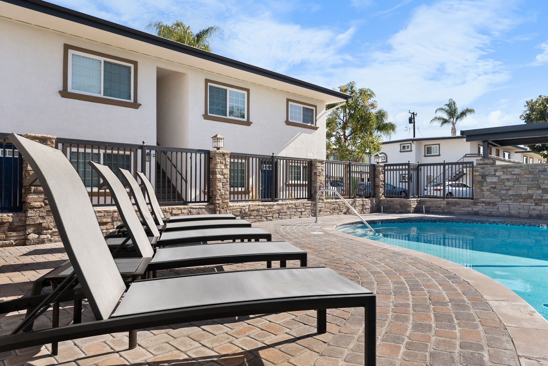 Lounge chairs and swimming pool