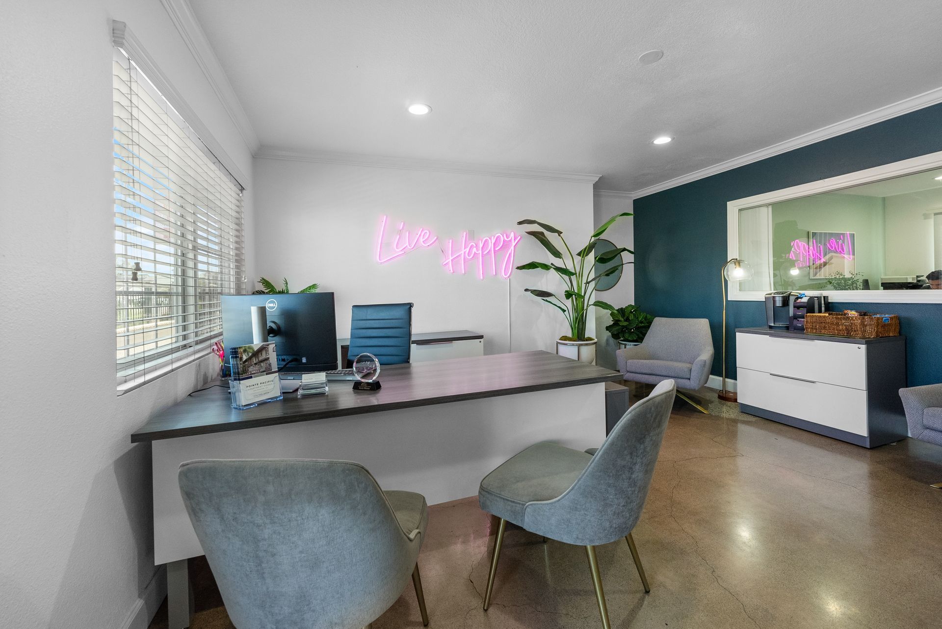 Leasing office with desk and chairs