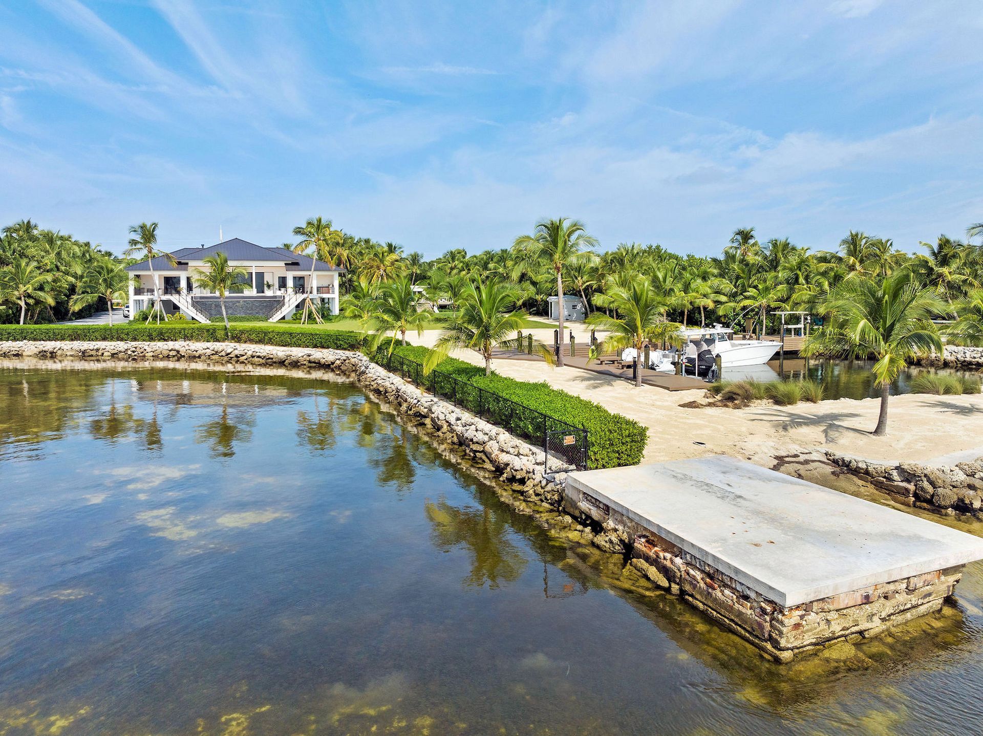 Private Marina, one of the many amenities of The Oasis in Islamorada, Florida is  offered for Sale by THE FIRM REALTY GROUP. 