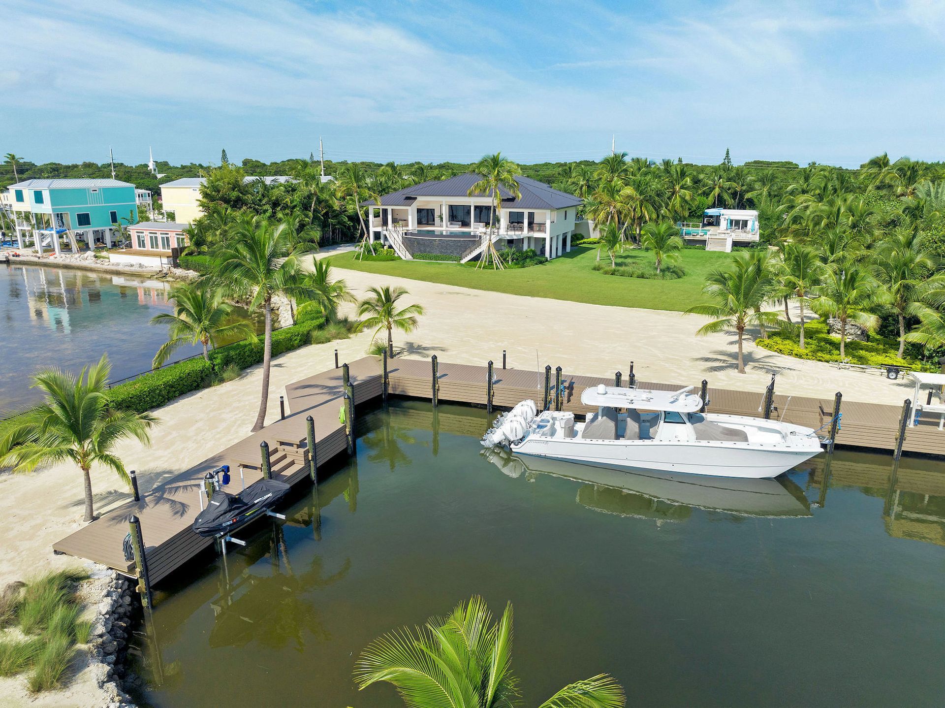 Private Marina, one of the many amenities of The Oasis in Islamorada, Florida is  offered for Sale by THE FIRM REALTY GROUP. 