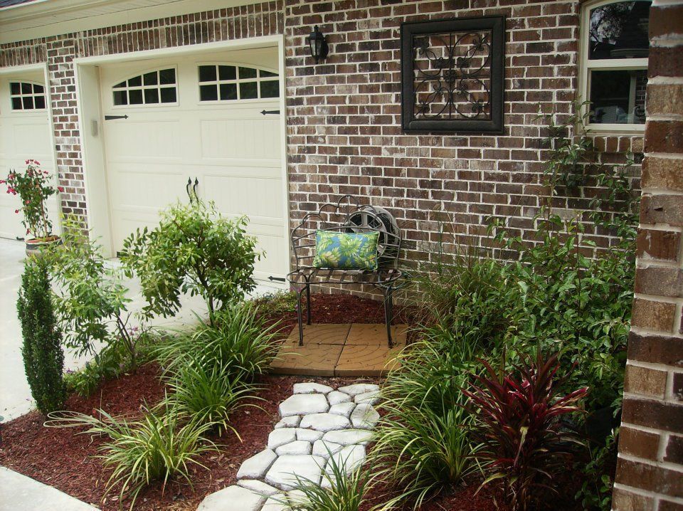 A living room with a ladder and a rug