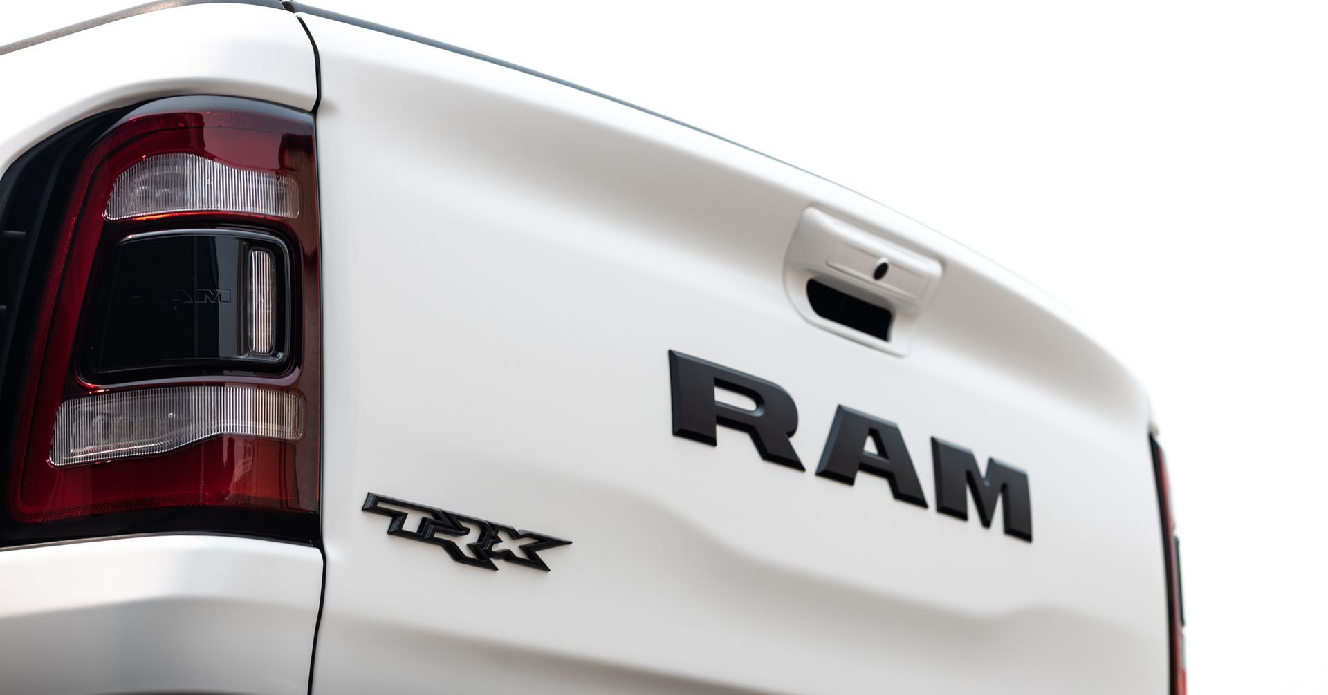 White Ram TRX truck's tailgate with black 