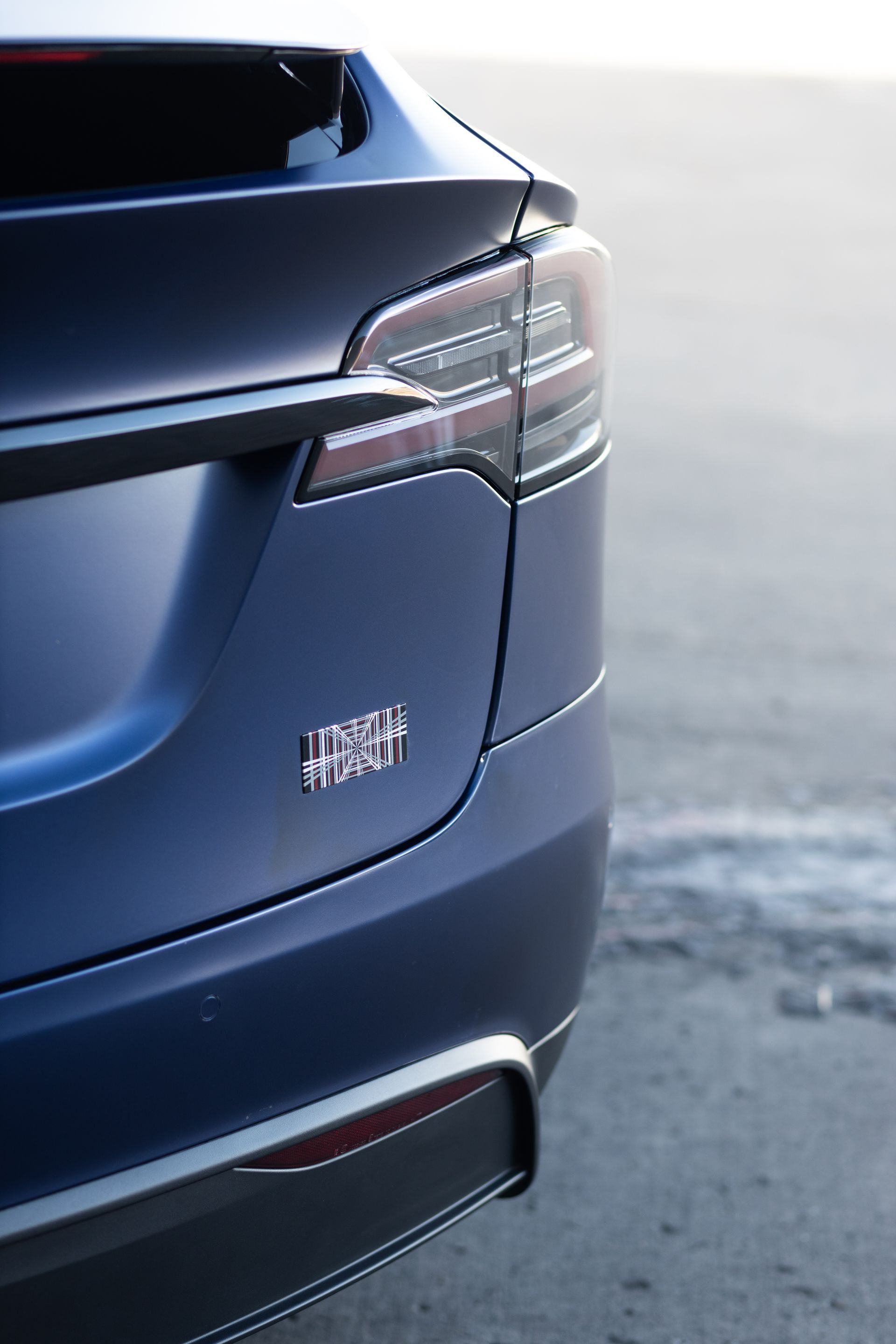 Blue Tesla Model S rear with taillight and 