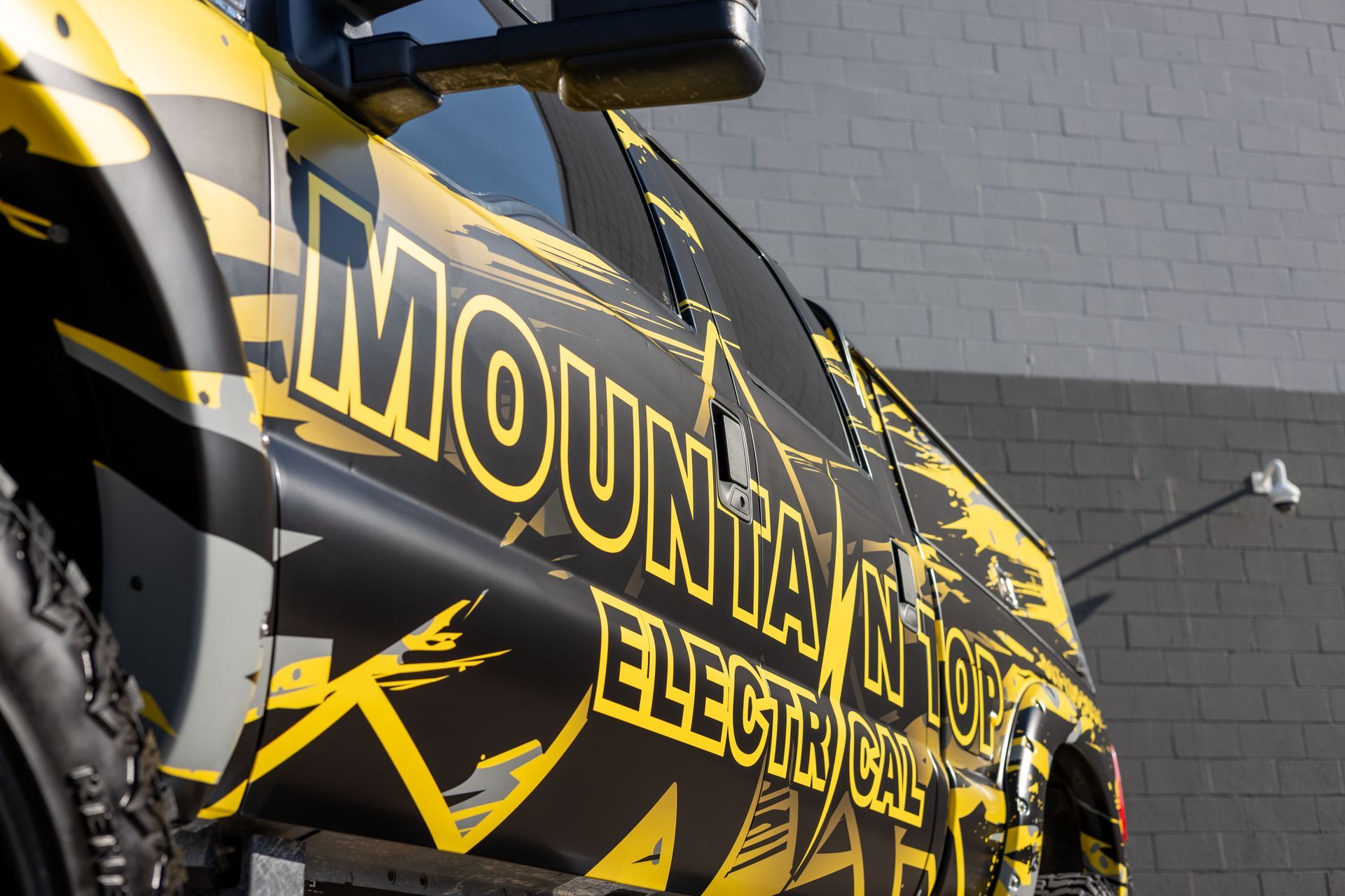 Black and yellow truck with