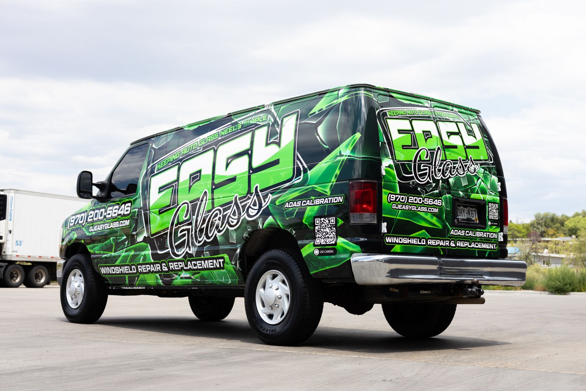 Green and black van with 