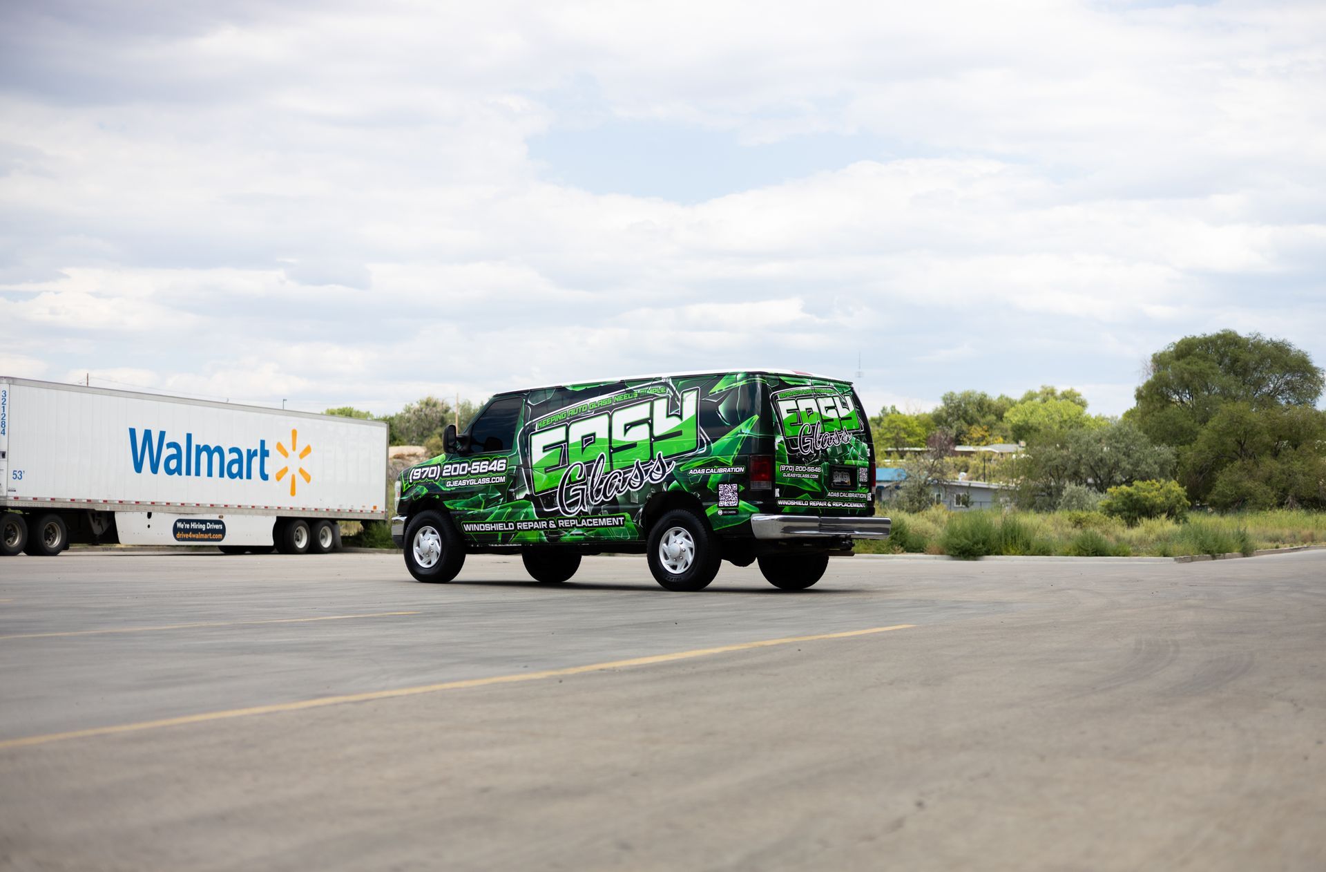 Green and black van with 