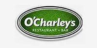 The logo for o 'charley 's restaurant and bar is green and white.