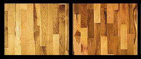 Two wooden floor samples side-by-side, one lighter, one darker.