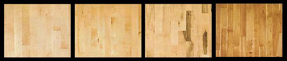 Four wood flooring samples, light brown with vertical grain.