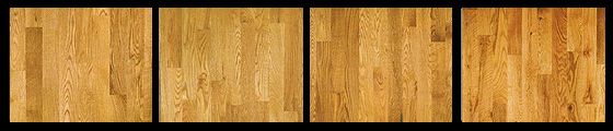Four wood flooring samples with varying shades of light brown.