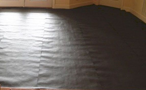 Dark floor with wrinkles.