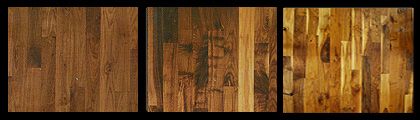 Three wood floor samples, showcasing variations in grain and color from light to dark brown.