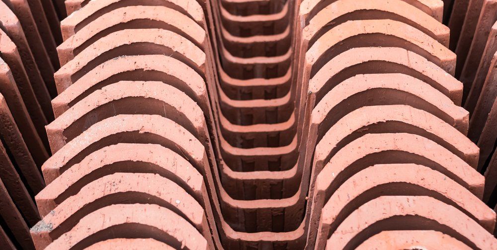 Pieces of Terracotta Roof Stacked — Second-Hand Roof Tiles in Hornsby, NSW