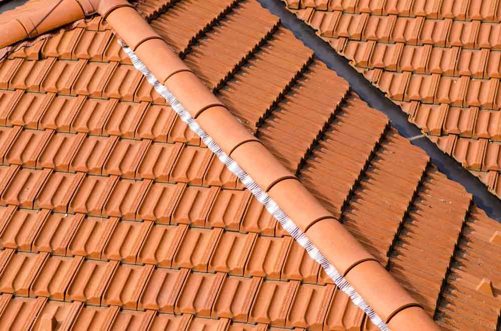 Orange Colour Roof Tiles Under Repair