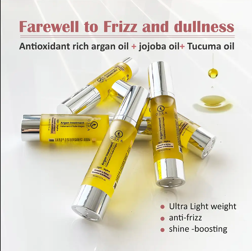 A cylindrical bottle of green liquid with a silver cap on a light peach background.