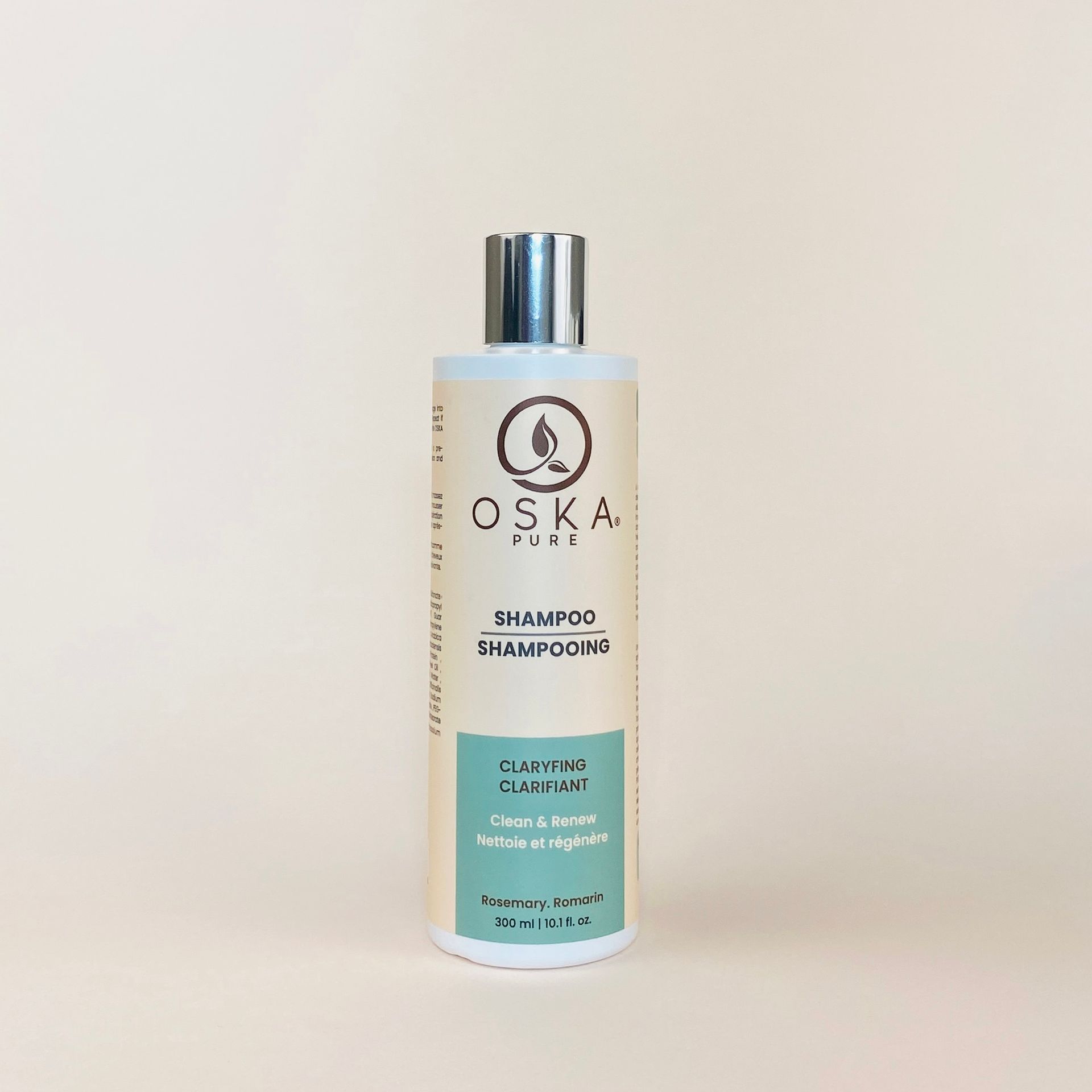 Bottle of Oska Pure clarifying shampoo on a light-colored background.