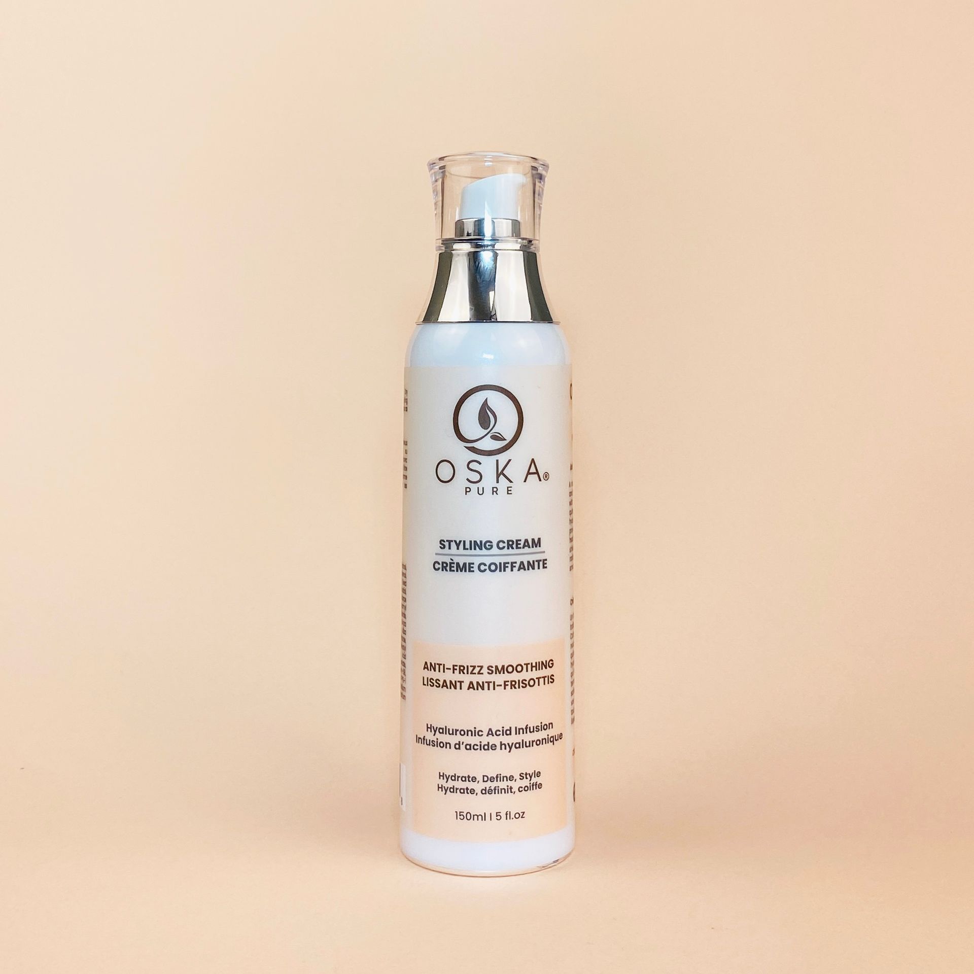 OSKA Plus bottle of hydrating cream with a pump on a beige background.