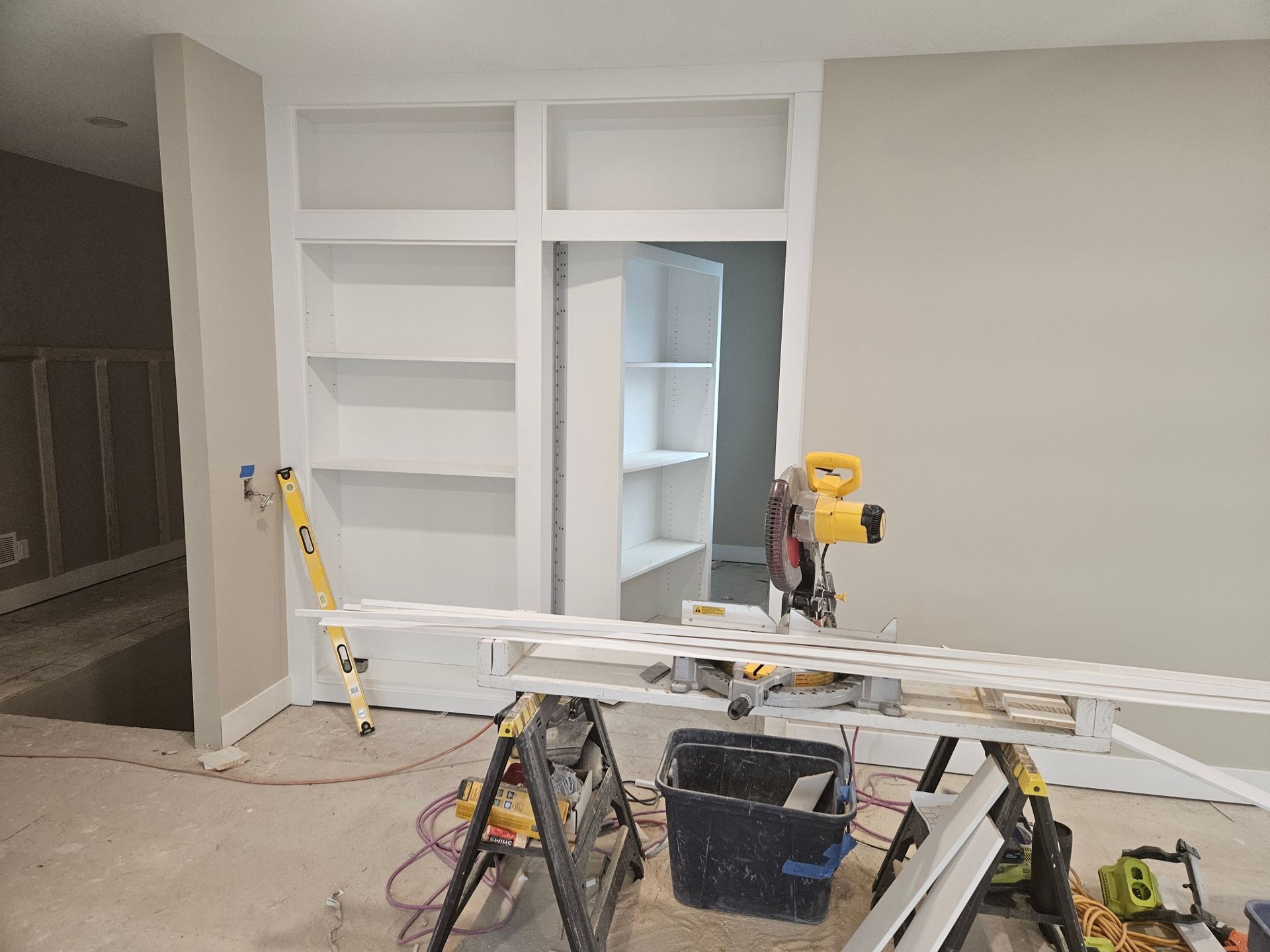 Custom cabinet and bookcase installation with table saw
