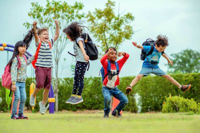 Happy Kids Jumping on The Field  — Burtonsville, MD — Childway Early Learning Center