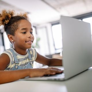Child with Her Laptop — Burtonsville, MD — Childway Early Learning Center