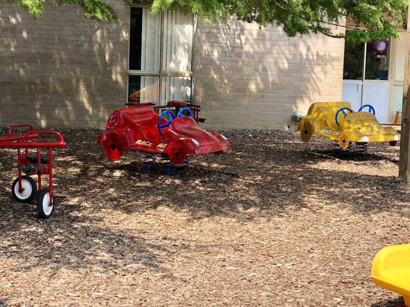 Red and Yellow Car in Playground — Burtonsville, MD — Childway Early Learning Center