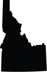 Silhouette of the state of Idaho in black.