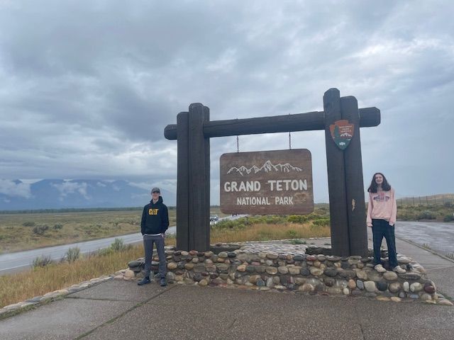 Two people stand near a