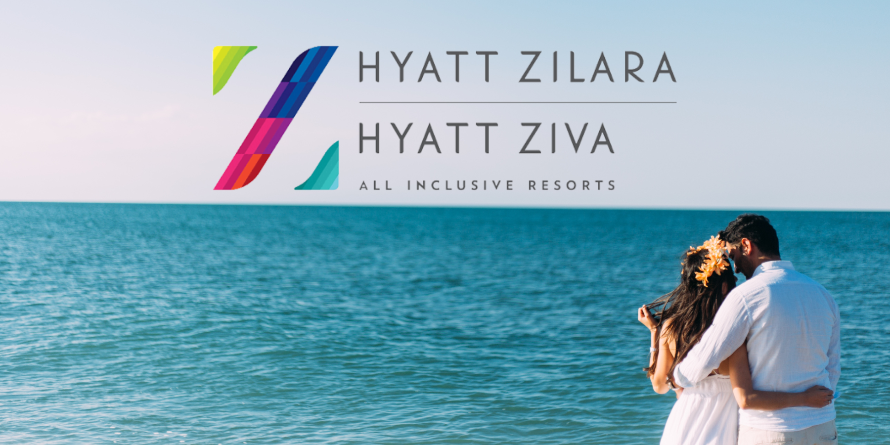 A man and a woman kissing on the beach in front of a hyatt ziva logo