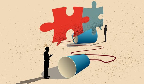 A man standing next to a cup that is connected to a puzzle piece | Elgin, IL | 'I' in Team Series By IA Business Advisors