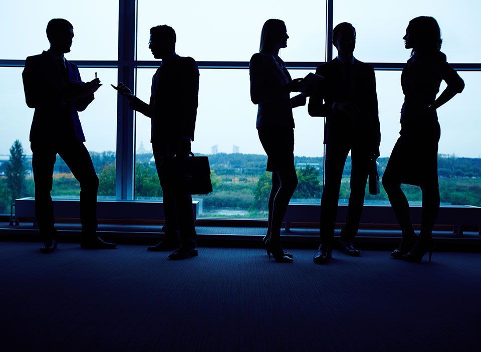 Silhouette of a group of people talking | Elgin, IL | 'I' in Team Series By IA Business Advisors