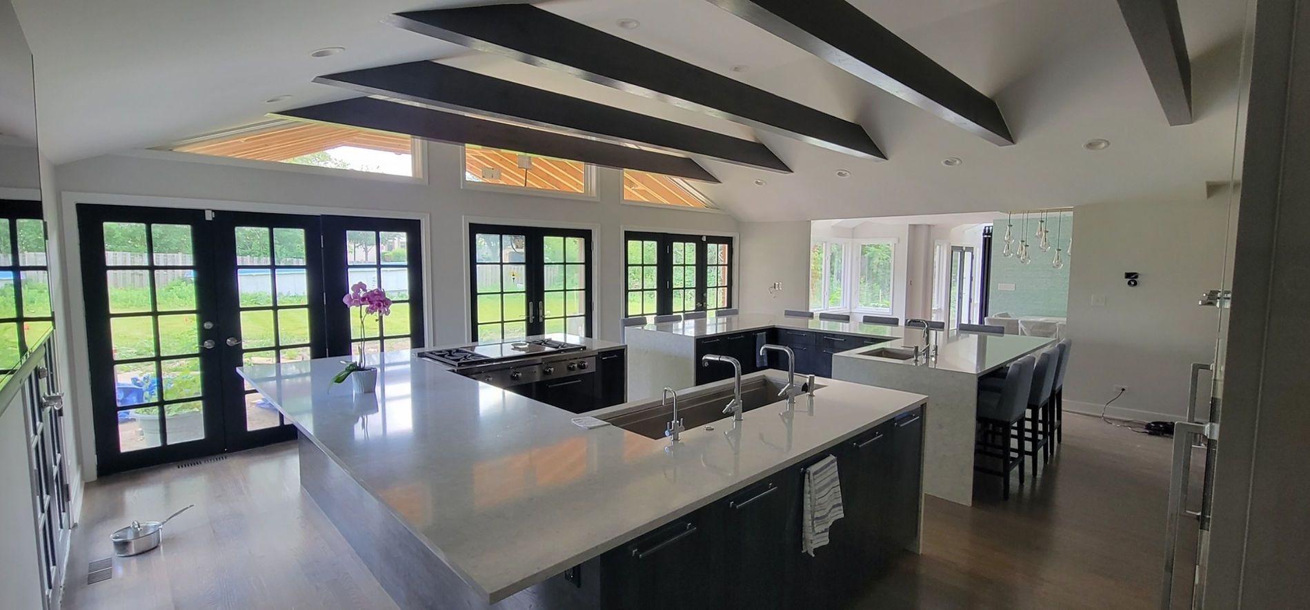 House Built With Scaffolding and Trees in the Background