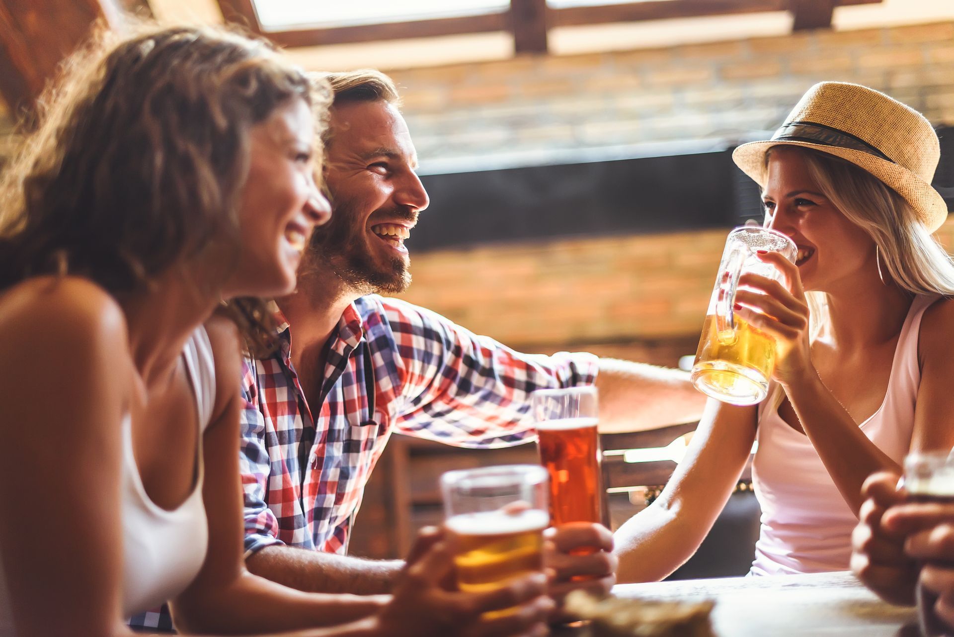 A sunset over a mountain range with a lot of fog