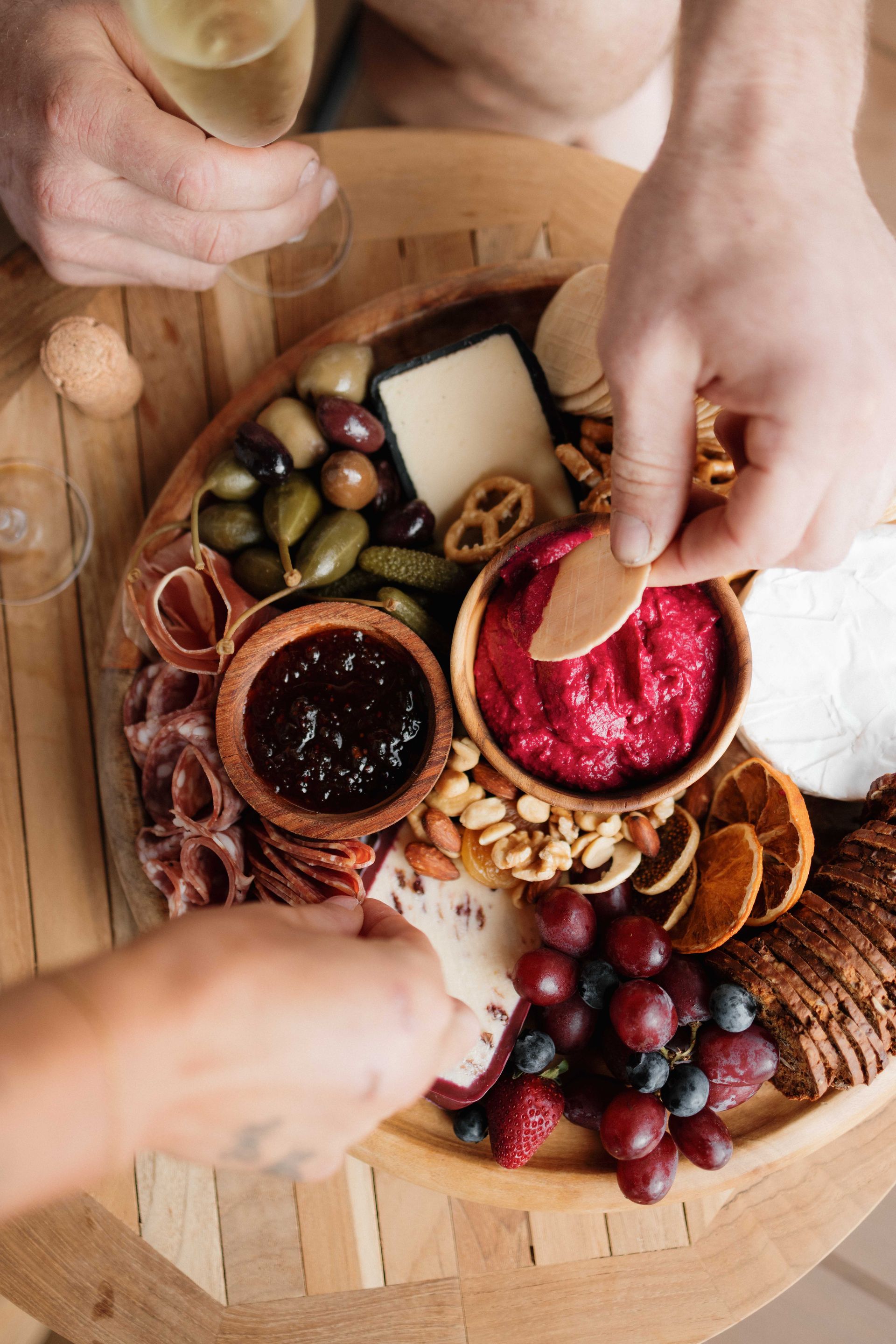 A sunset over a mountain range with a lot of fog