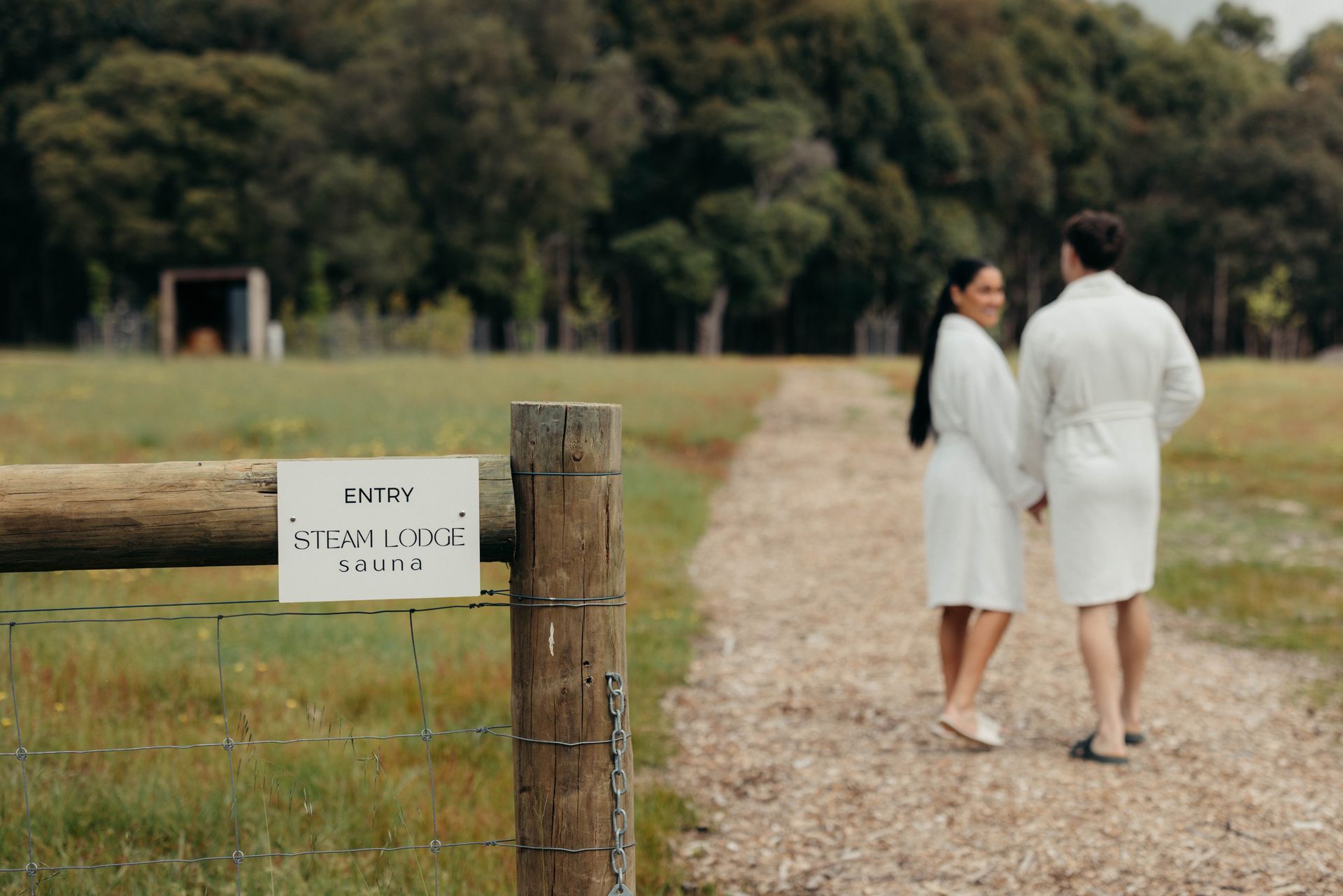 A sunset over a mountain range with a lot of fog